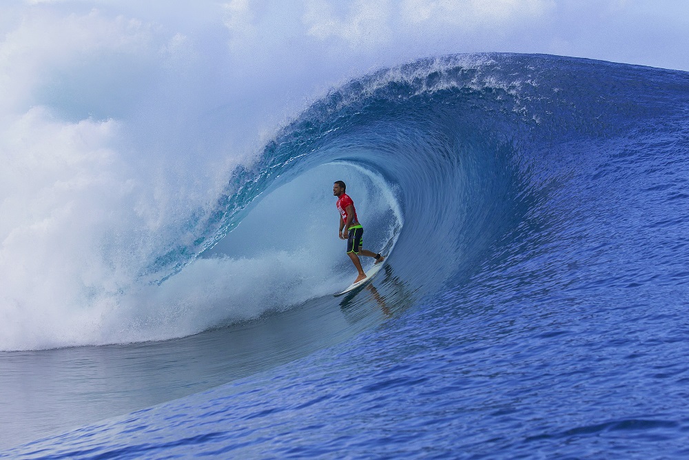 Michel Bourez of Tahiti, French Polynesia (pictured) exits a barrel during Round 1 of the Billabong Pro Tahiti on Monday August 18, 2014. Bourez won his heat deafeating Matt Wilkinson (AUS) and Raoni Monteiro (BRA) advacing directly into Round 3.